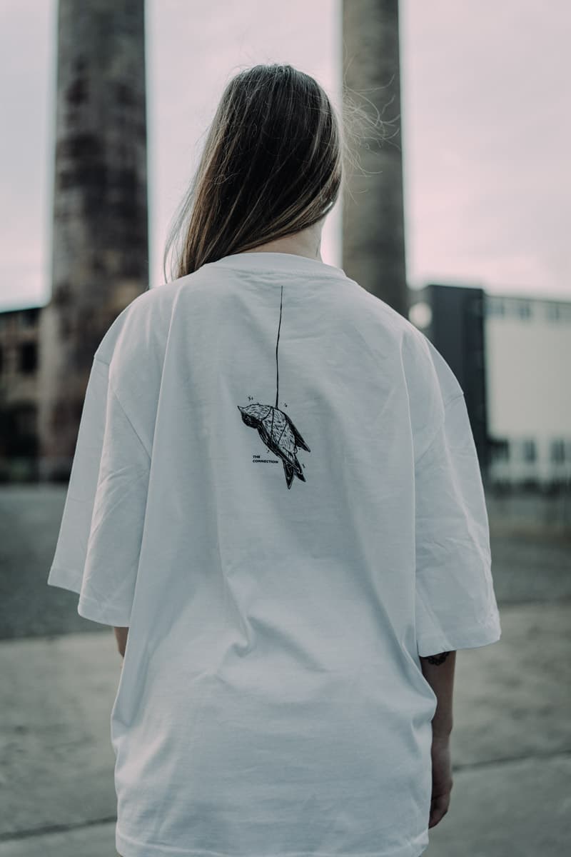 White oversized t-shirt with CONNECTION OVERSIZED TEE UNISEX print - Wolfpack Clothing