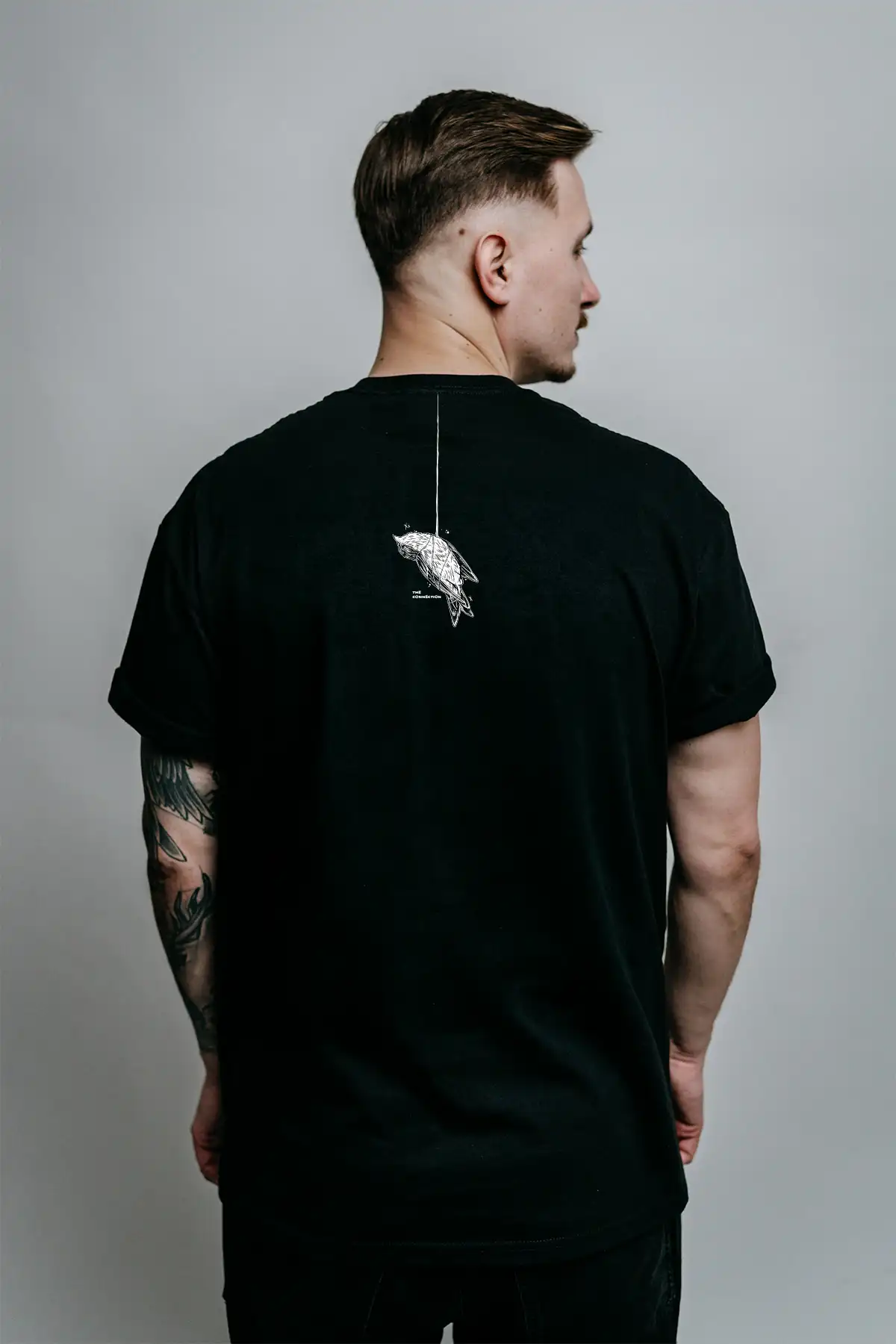 Black t-shirt with CONNECTION TEE UNISEX print - Wolfpack Clothing